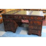 An Early/Mid 20th Century Desk Having Two Banks of Four Short Drawers with Central Long Drawer,