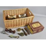 A Wicker Basket Containing Door Handles and Stair Clips Etc