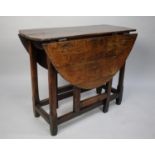 A 19th century Oak Drop Leaf Gate Leg Table with Oak Top, 93cms Long