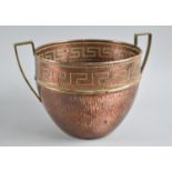 An Arts and Crafts Influenced Hand Beaten Copper Planter with Brass Handle, 20cms Diameter and 16cms
