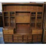 A Nathan 1960's Teak Lounge Unit with Central Fold Down Mirrored Drinks Cabinet Store, Flanked by