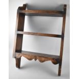 An Edwardian Oak Three Tier Wall Hanging Shelf Unit, 45cms Wide