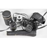 A Asahi Pentax ES Camera Body with SMC Takumar 55mm Lense, a Prinzflex Auto Reflex 135mm Lense, an