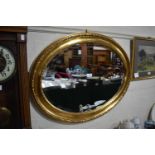A Oval Gilt Framed Bevel Edge Wall Mirror