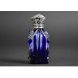 A Mid 19th Century Blue Flash Overlaid and Silver Topped Perfume Bottle, Complete with Stopper,