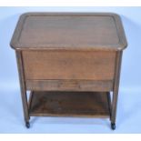 A Mid 20th Century Oak Sewing Trolley with Hinged Lid to Top Storage Compartment, Centre Drawer