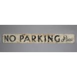 A Printed No Parking Please Sign