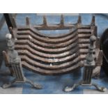 A Cast Iron Fire Basket with Dogs in the Form of Reeded Columns Supported on Claw Feet, 44cms Wide