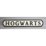 A Modern Wooden Sign, "Hogwarts", in the Form of Cast Iron Road or Street Sign, 78cm Long