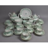 A 19th Century Porcelain Tea Service decorated with Green Transfer Scrolled Foliage to comprise
