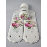 A Pair of Rose Patterned Ceramic Door Finger Plates together with a Set of Matching Ceramic Door