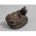 A Small Bronze Study of Sow and Litter, 5.5cms Long