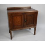 A Victorian Galleried Oak Side Cabinet with Panelled Door, 77cms Wide