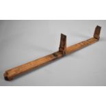 A Vintage Folding Wooden Ruler or Shoe Stick with Sliding Stops, Stamped George Barnsley and Sons