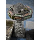 A Reconstituted Stone Garden Bird Bath with Octagonal Top on Stylised Brick Stepped Support together