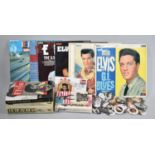 A Collection of Elvis Books, LP's and Lapel Badges