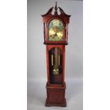 A Modern Reproduction Mahogany Stained Long Case Clock with Battery Movement