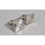 A Pair of Silver Cufflinks with Having Starburst Square Tops, Stamped to Bars