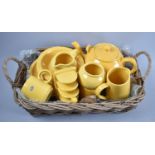 An Arthur Woods Yellow Glazed Breakfast Set to comprise Mugs, Plates, Bowls Tea Pot Etc