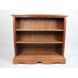 A Mid 20th Century Mahogany Two Shelf Open Bookcase with Reeded and Moulded Decoration, 106cms Wide