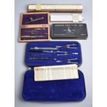 A Collection of Vintage Drawing Sets, Slide Rules etc