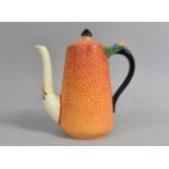 An Art Deco Crown Staffordshire Mottled Orange Coffee Pot with Black Strap Handle Culminating From