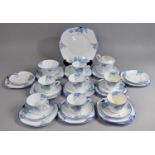 An Art Deco English Bone China Floral Decorated Tea Set to comprise Seven Cups, Saucers, Side