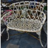 A Late 19th/Early 20th Century Cast Metal White Painted Garden Bench of Pierced Floral Design, Bowed