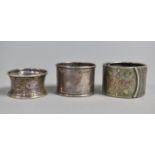 Two Hallmarked Silver Napkin Rings Together with an Unmarked Example Having Mixed Metal Design on