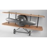 A Modern Novelty Wall Shelf in the form of a Biplane, 60cm wide