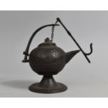 A Cast Bronze Indian Temple Oil Lamp with Engraved Decoration, 14cms High