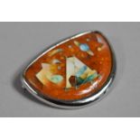 An Interesting Contemporary Cloisonne Brooch of Pebble form Decorated with Teepee Desert Scene
