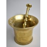 A 19th Century Brass Pestle and Mortar, 15.5cms Diameter and 12cms High