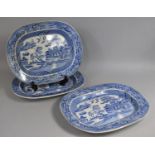 A Set of 22 Blue and White Transfer Printed Willow Pattern Plates together with Three Large Meat