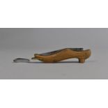 A Vintage Novelty Folding Pocket Knife in the Form of a Ladies Shoe together with a Miniature
