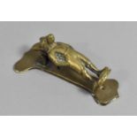 A Vintage Brass Doorknocker in the Form of an Anthropomorphic Rabbit in Shorts, 9cms High