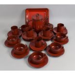 A Rouge Glazed Tea/Coffee Set to comprise Cups, Pots, Milk Jug Etc together with a French Glazed