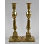 A Pair of 19th Century Brass Candlesticks, 25cms High