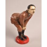 A Reproduction Cold Painted Novelty Humorous Pin Cushion in the Form of Hitler Bending Over, Cold