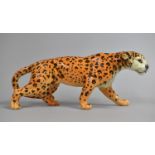 A Beswick Leopard, 30cm wide