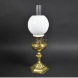 A Late 19th/Early 20th Century Brass Oil Lamp with Opaque Glass Shade and Chimney, 62cm high