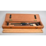 An Edwardian Mahogany Pencil Box Containing Pencils, Rubbers and Slide Rule by Baird and Taplock,