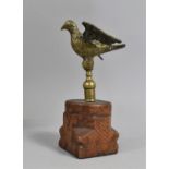 An Early Brass Finial, Modelled as a Pigeon with Wings Outstretched and Mounted on Carved Wooden