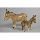 A Beswick Donkey and Foal