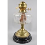 A Late Victorian/Edwardian Brass Oil Lamp Base with Moulded Glass Reservoir, No Chimney or Shade,