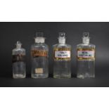 A Collection of Four 19th and 20th Century Pharmaceutical Glass Bottles, Tallest 20cm high