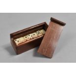 A Miniature Cased Set of Bone Dominoes, 5.5cms Wide