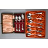 A Cased Set of Six Silver Teaspoons together with a Cased Set of Three Enamelled Silver Plated
