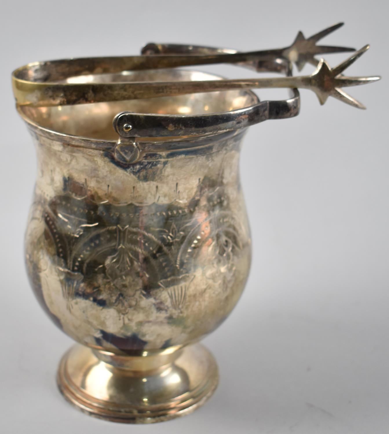 A Modern Silver Plated Ice Bucket with Tongs, Engraved Decoration, 16cms High