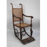 A 19th Century Oak Framed Invalid Cane Back and Seated Wheelchair